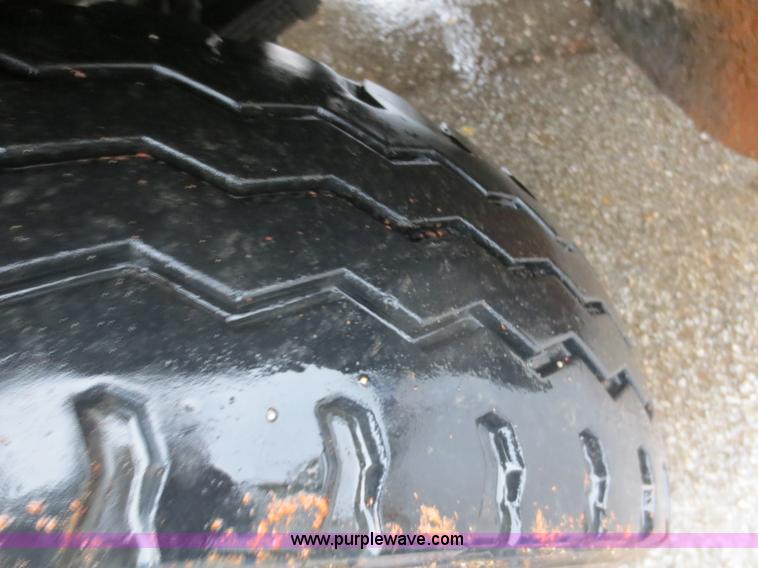 image for item F8010 1996 Volvo WG roll off truck