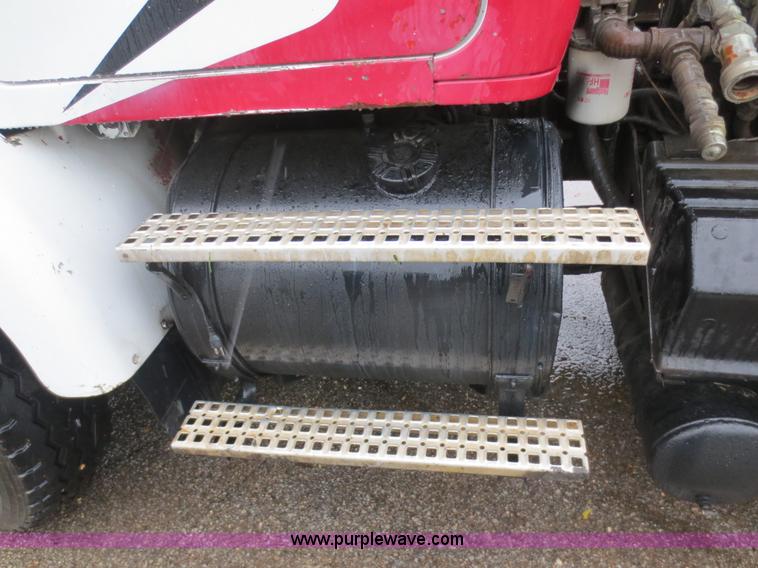 image for item F8010 1996 Volvo WG roll off truck