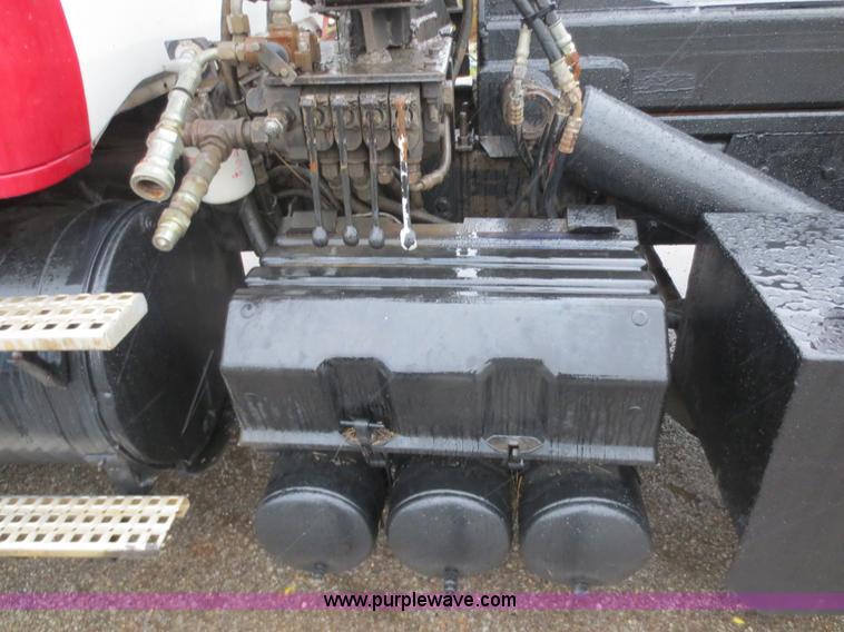 image for item F8010 1996 Volvo WG roll off truck