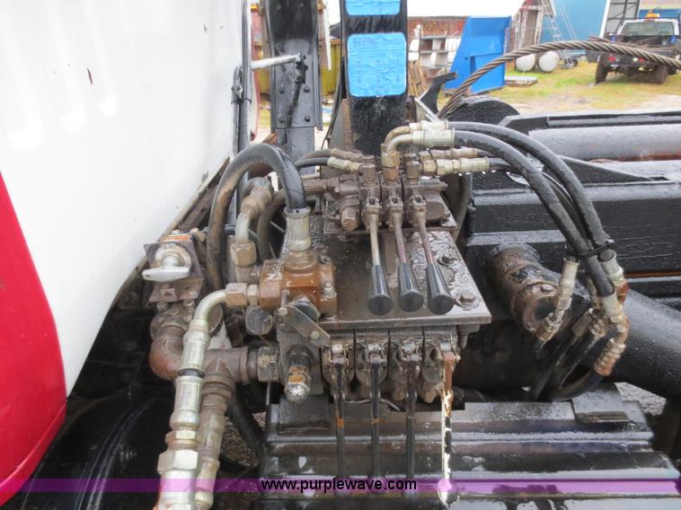 image for item F8010 1996 Volvo WG roll off truck