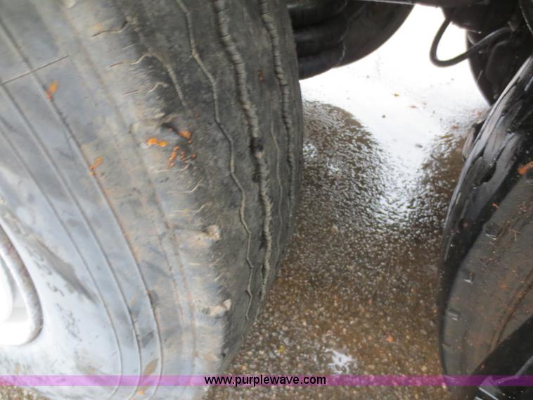 image for item F8010 1996 Volvo WG roll off truck