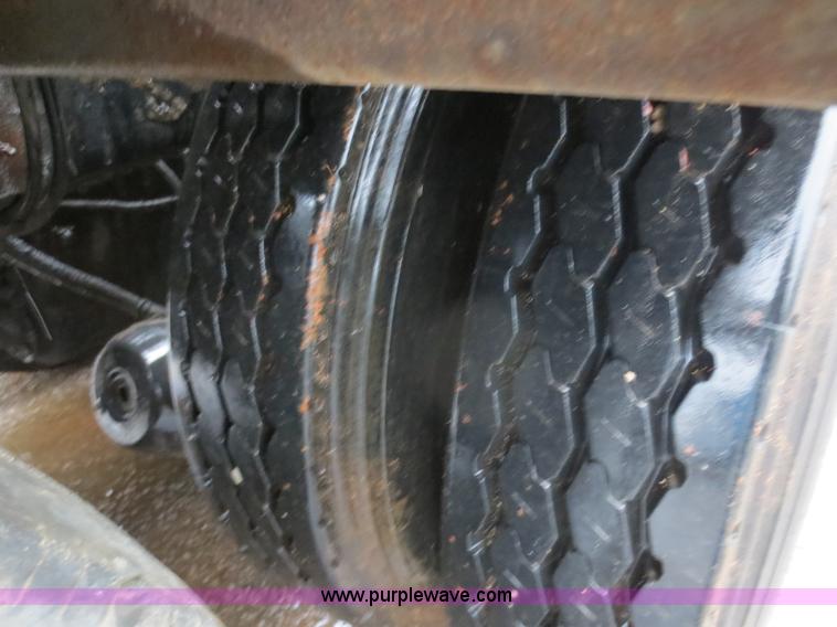 image for item F8010 1996 Volvo WG roll off truck