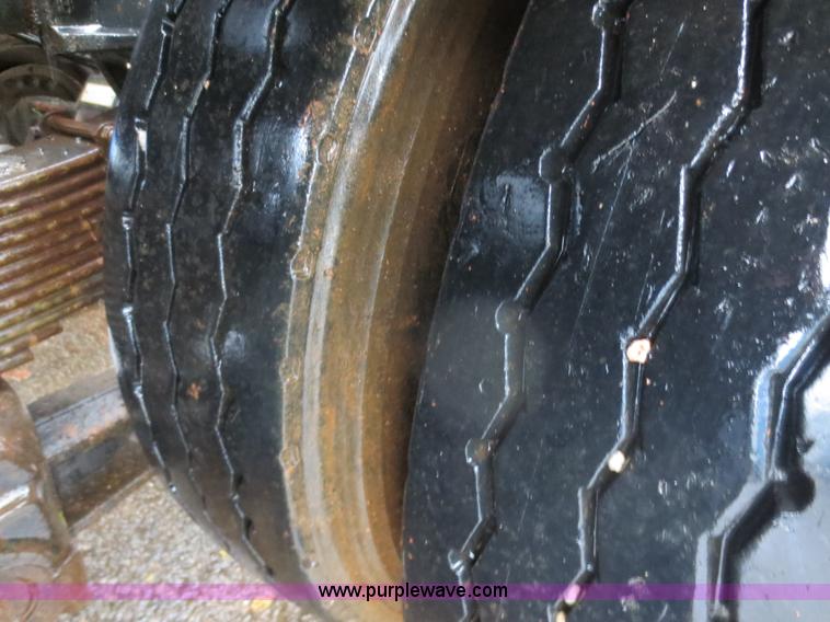 image for item F8010 1996 Volvo WG roll off truck