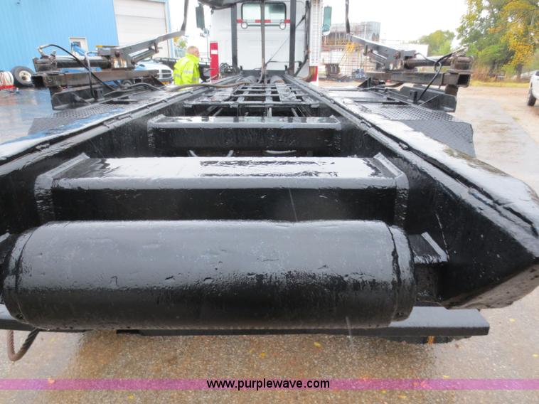 image for item F8010 1996 Volvo WG roll off truck