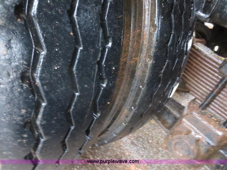 image for item F8010 1996 Volvo WG roll off truck