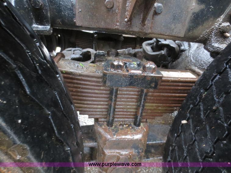 image for item F8010 1996 Volvo WG roll off truck