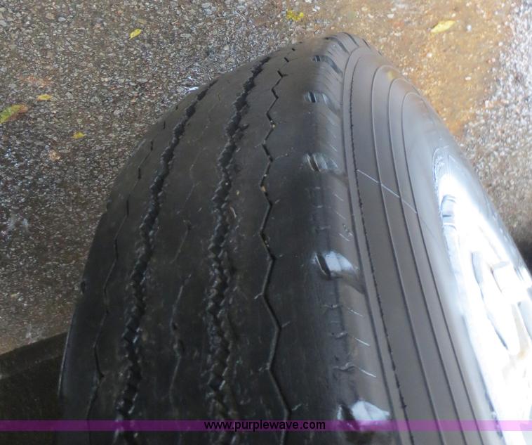 image for item F8010 1996 Volvo WG roll off truck