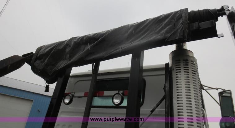 image for item F8010 1996 Volvo WG roll off truck