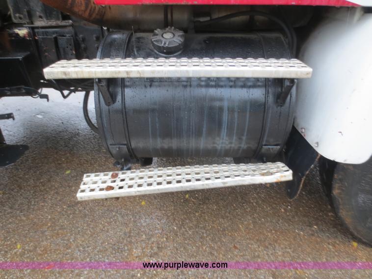 image for item F8010 1996 Volvo WG roll off truck