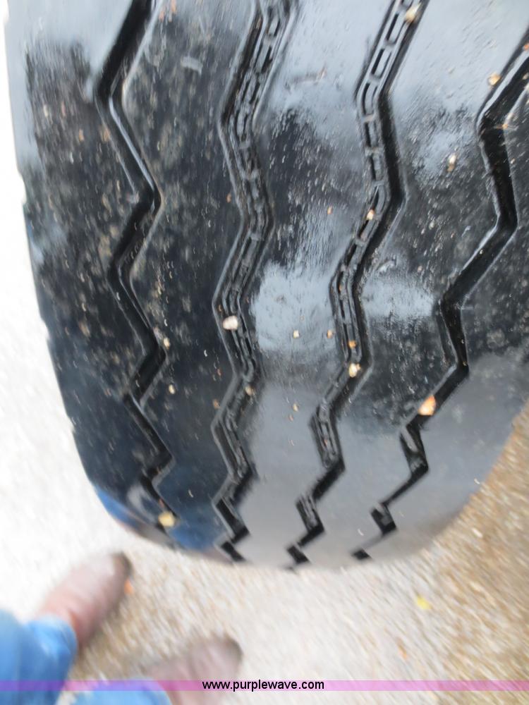 image for item F8010 1996 Volvo WG roll off truck