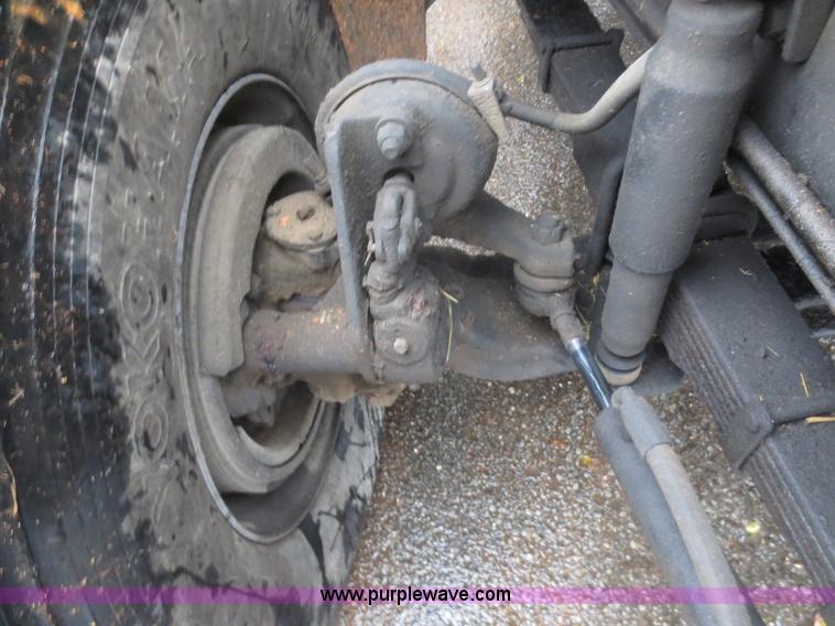 image for item F8010 1996 Volvo WG roll off truck