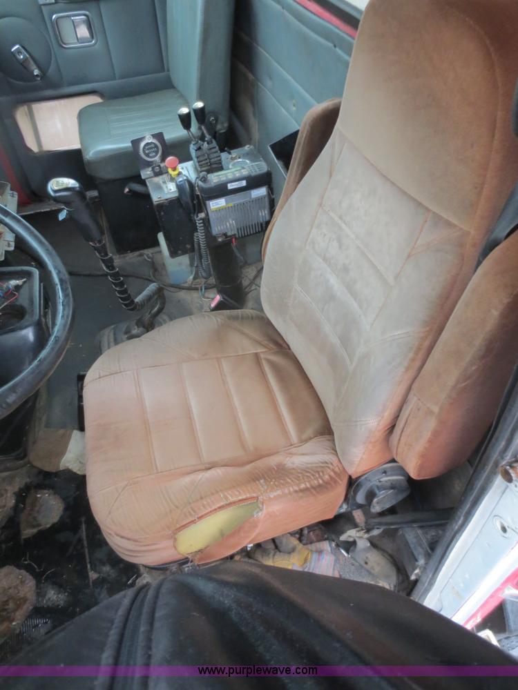 image for item F8010 1996 Volvo WG roll off truck