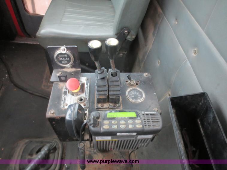 image for item F8010 1996 Volvo WG roll off truck