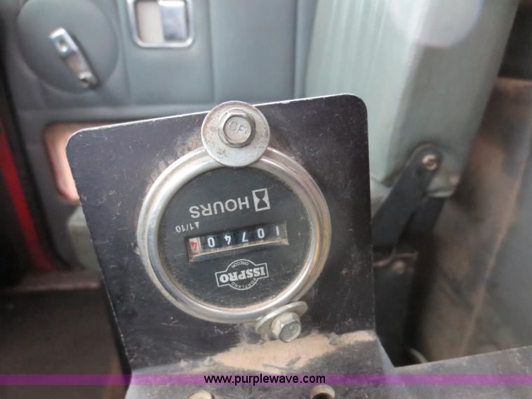 image for item F8010 1996 Volvo WG roll off truck