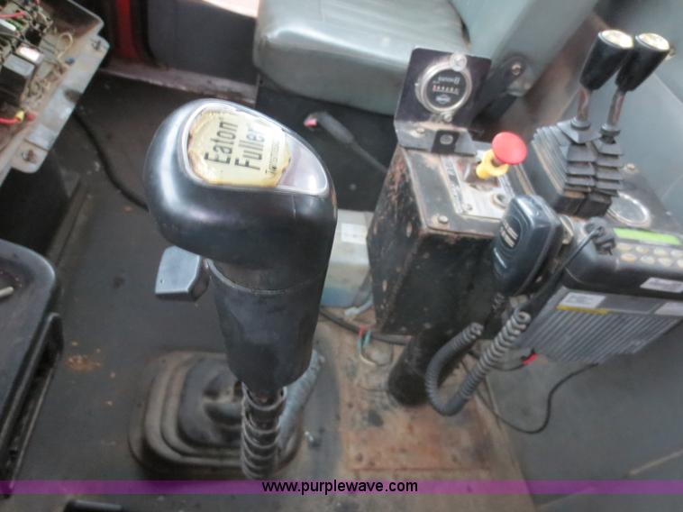 image for item F8010 1996 Volvo WG roll off truck