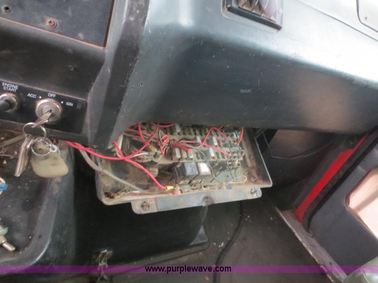 image for item F8010 1996 Volvo WG roll off truck