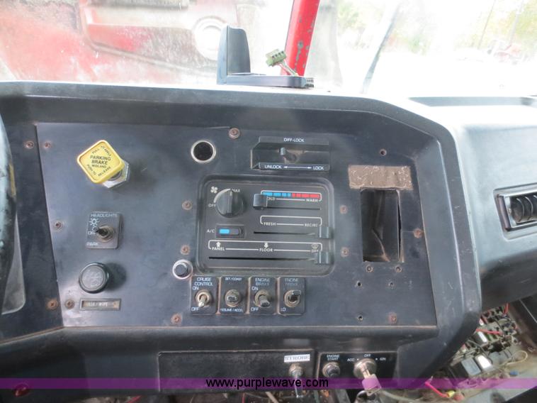 image for item F8010 1996 Volvo WG roll off truck