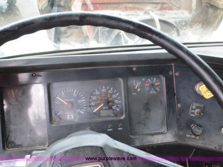 image for item F8010 1996 Volvo WG roll off truck