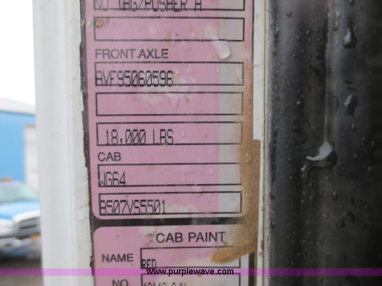 image for item F8010 1996 Volvo WG roll off truck