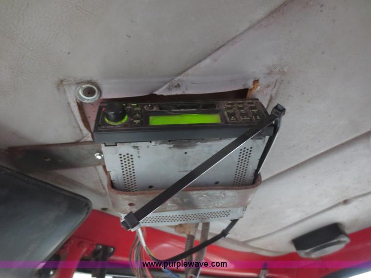 image for item F8010 1996 Volvo WG roll off truck