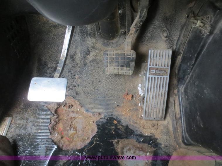 image for item F8010 1996 Volvo WG roll off truck