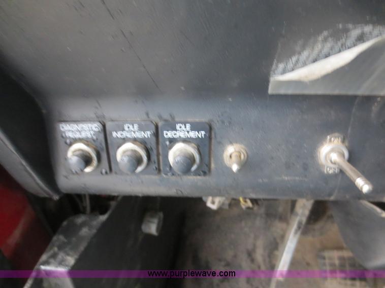 image for item F8010 1996 Volvo WG roll off truck