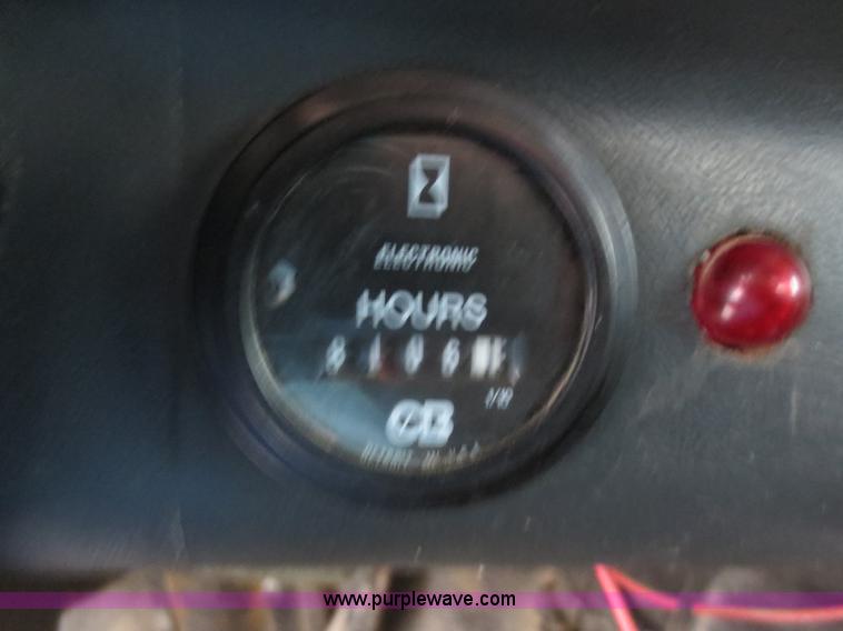 image for item F8010 1996 Volvo WG roll off truck