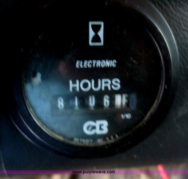 image for item F8010 1996 Volvo WG roll off truck