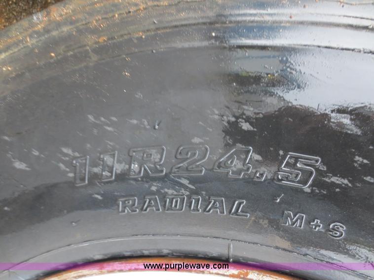 image for item F8010 1996 Volvo WG roll off truck