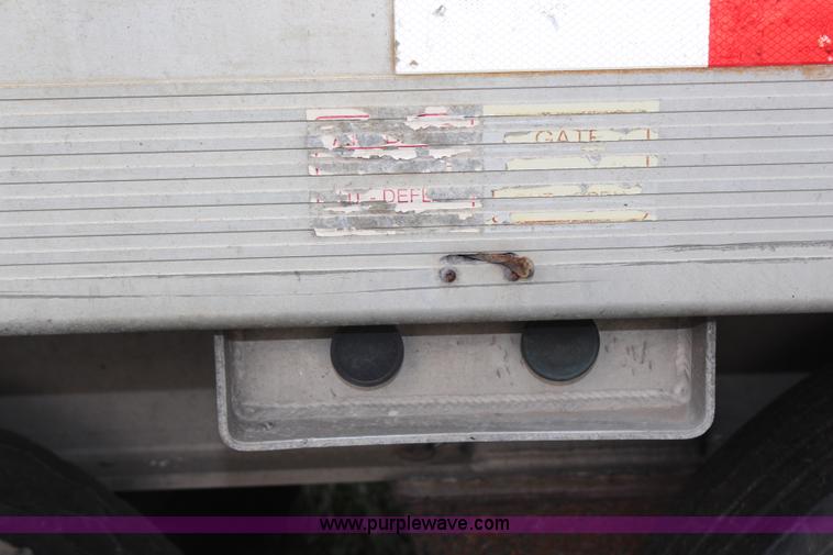 image for item H6905 2001 Travis end dump trailer