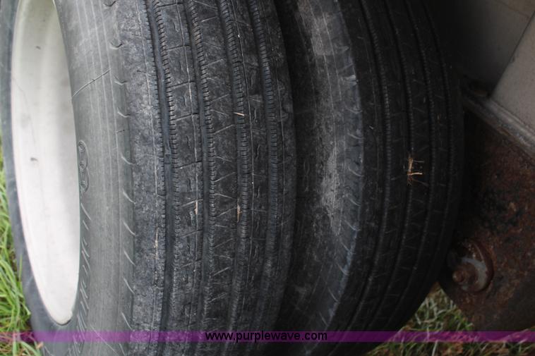 image for item H6905 2001 Travis end dump trailer