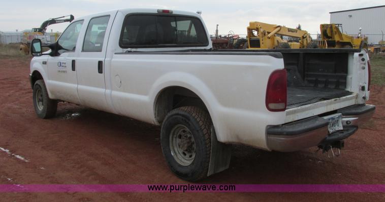 image for item AH9990 2004 Ford F250 Super Duty XL Crew Cab pickup truck