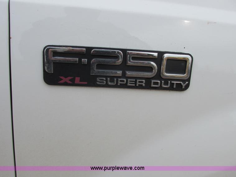 image for item AH9990 2004 Ford F250 Super Duty XL Crew Cab pickup truck