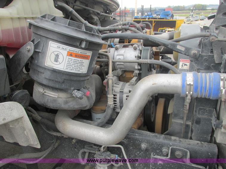 image for item AN9148 2007 Freightliner Business Class M2 rollback truck