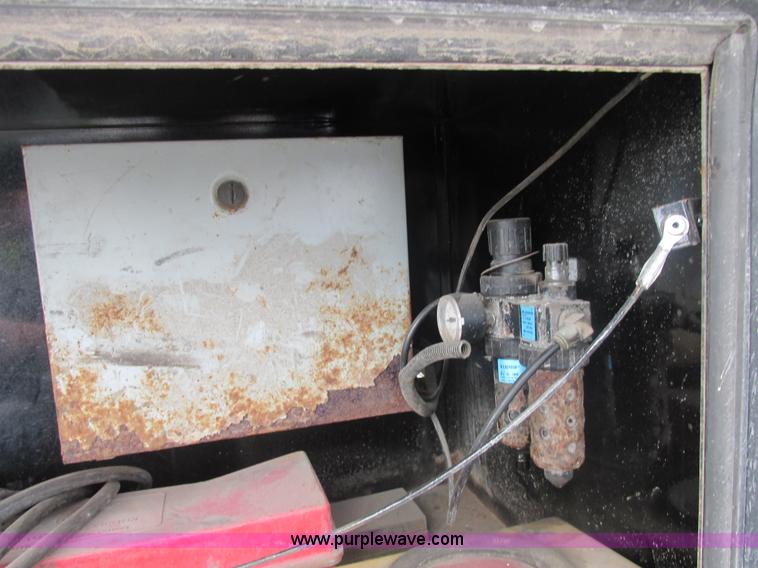 image for item AN9148 2007 Freightliner Business Class M2 rollback truck