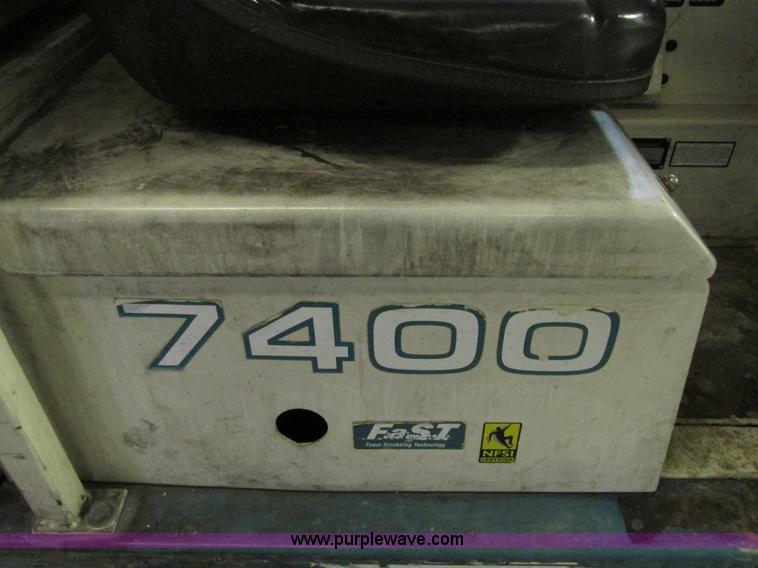 image for item G9203 2006 Tenant 7400 ride-on floor scrubber