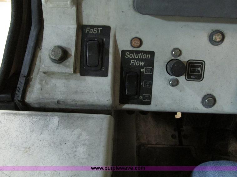 image for item G9203 2006 Tenant 7400 ride-on floor scrubber