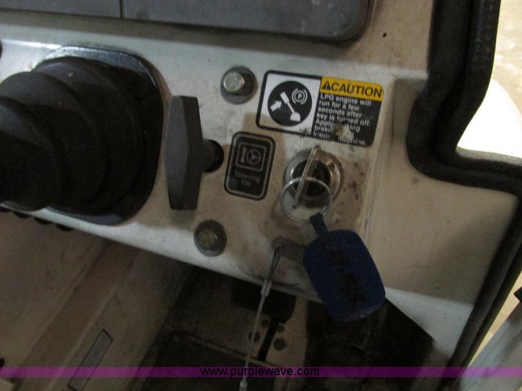 image for item G9203 2006 Tenant 7400 ride-on floor scrubber