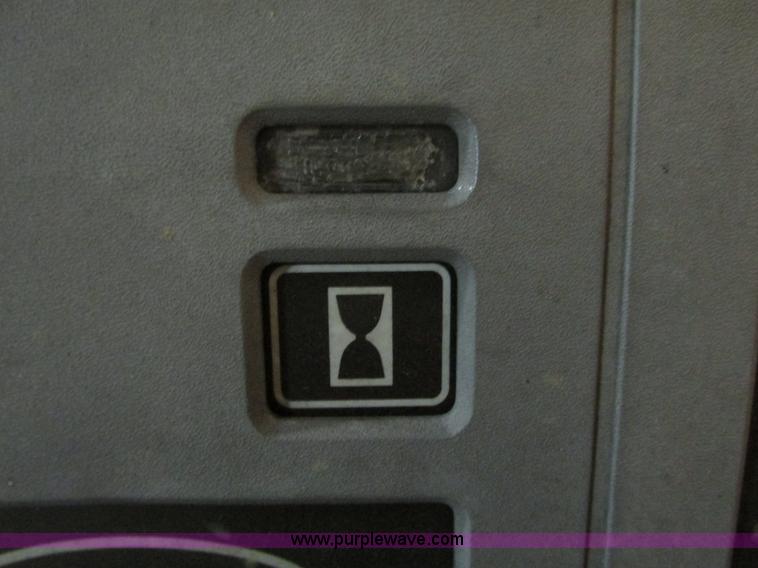 image for item G9203 2006 Tenant 7400 ride-on floor scrubber