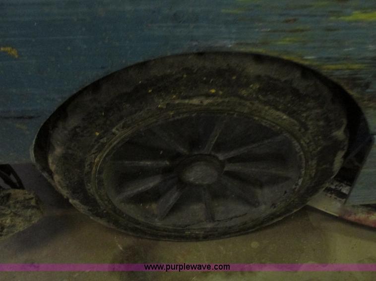 image for item G9203 2006 Tenant 7400 ride-on floor scrubber