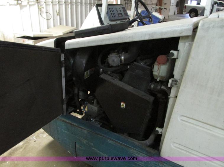 image for item G9203 2006 Tenant 7400 ride-on floor scrubber