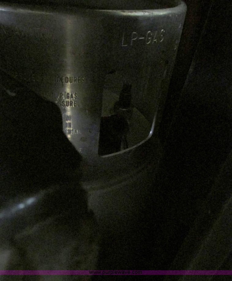 image for item G9203 2006 Tenant 7400 ride-on floor scrubber