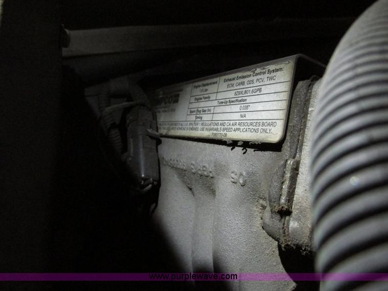 image for item G9203 2006 Tenant 7400 ride-on floor scrubber