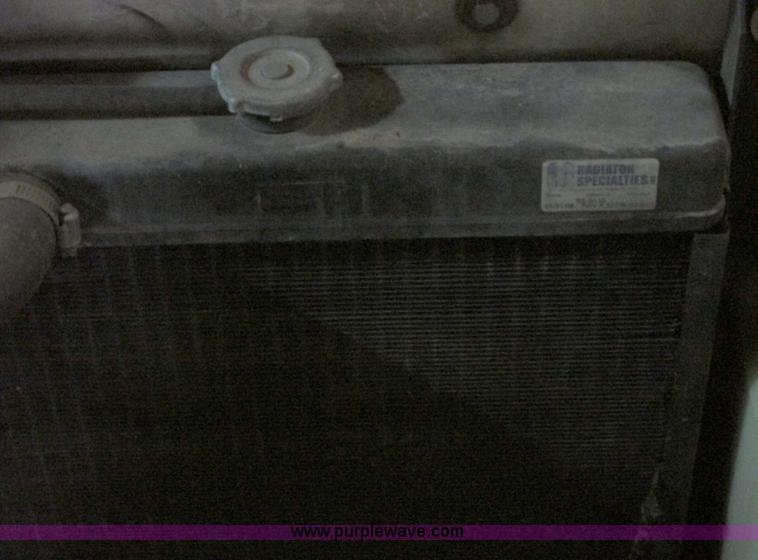 image for item G9203 2006 Tenant 7400 ride-on floor scrubber