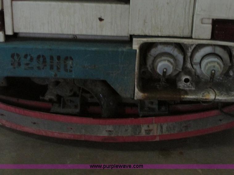 image for item G9203 2006 Tenant 7400 ride-on floor scrubber