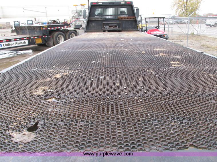 image for item G9205 2006 Freightliner Business Class M2 roll back truck