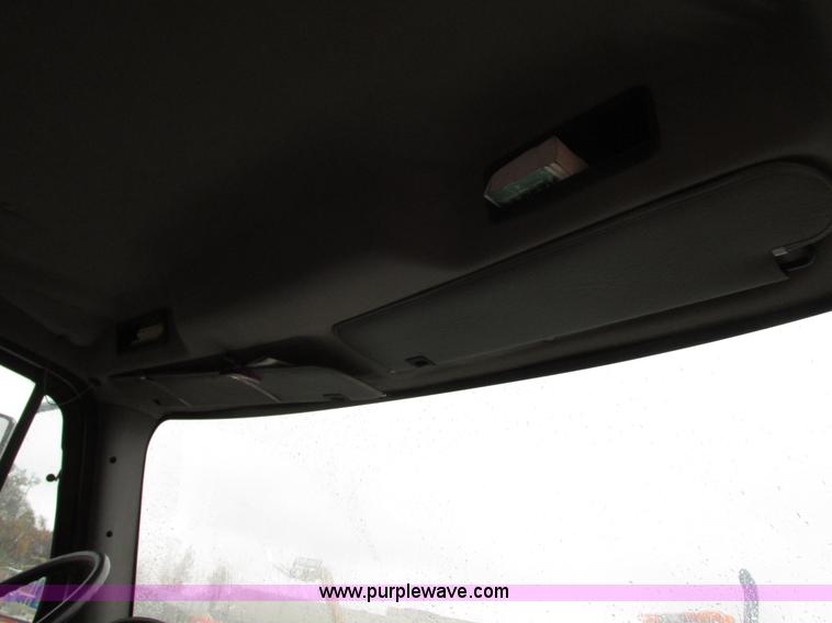 image for item G9205 2006 Freightliner Business Class M2 roll back truck