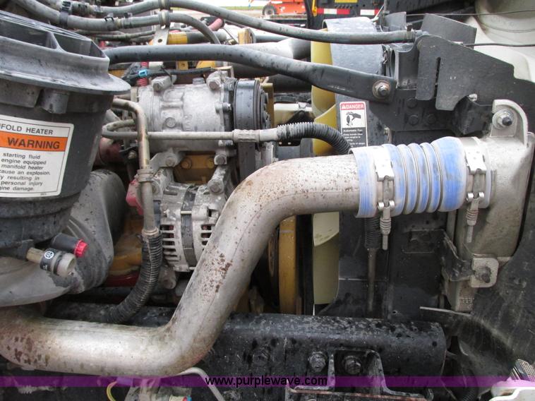 image for item G9205 2006 Freightliner Business Class M2 roll back truck