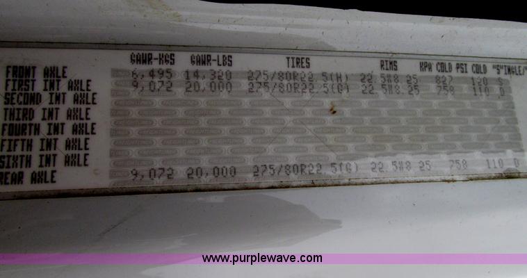 image for item G9205 2006 Freightliner Business Class M2 roll back truck