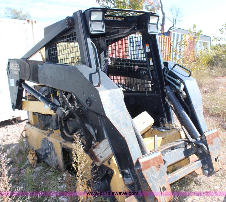 image for item H6819 New Holland LX885 skid steer